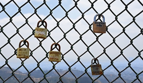 Locks on fence above the Hollywood sign